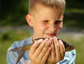 Picture of boy holding fish