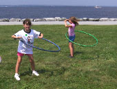 Picture of 2 girls hoolahooping